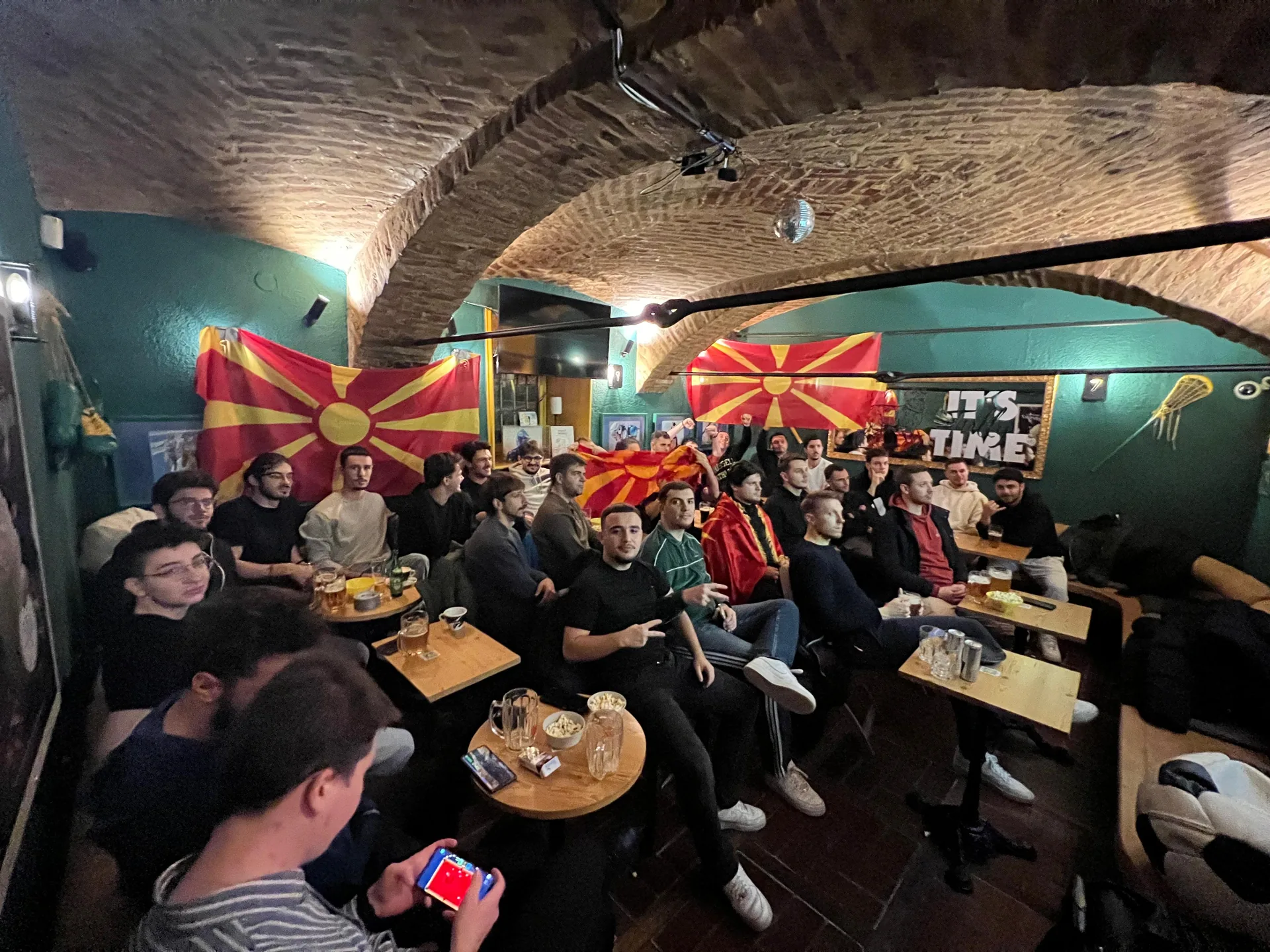 Watching the Football Match Between Macedonia and Wales Together