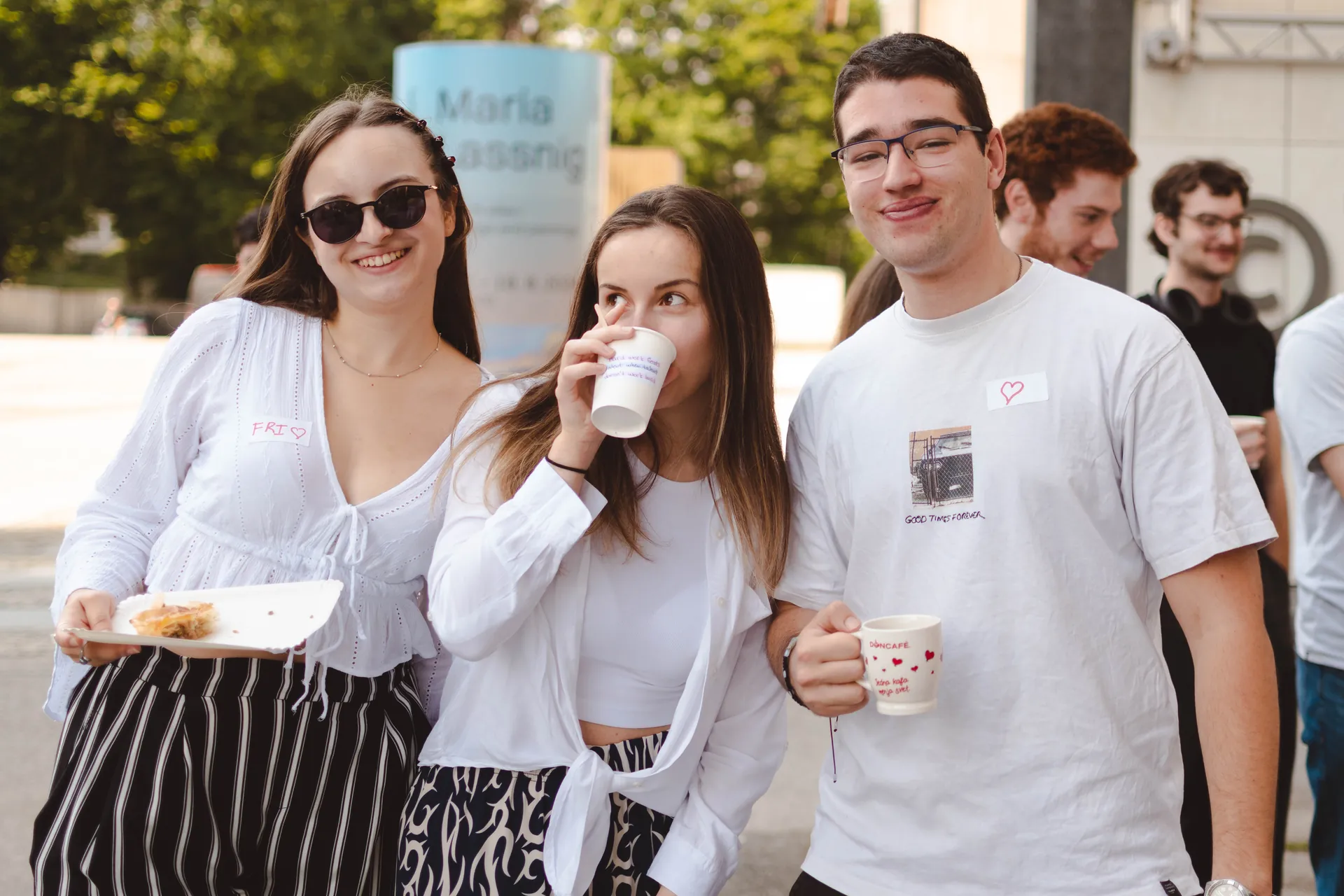 Students enjoying coffee and burek in front of CTK library